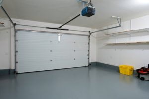 Painting the walls and sealing the floor of your garage makes the space more versatile.